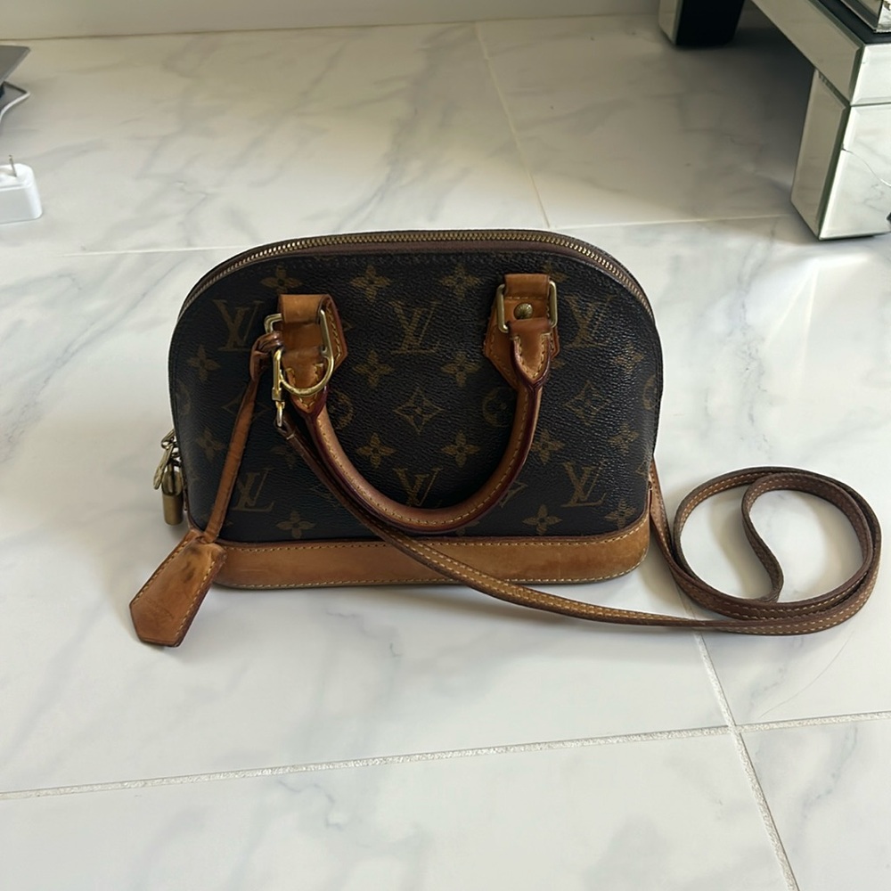 Louis Vuitton Alma BB monogram shoulder bag